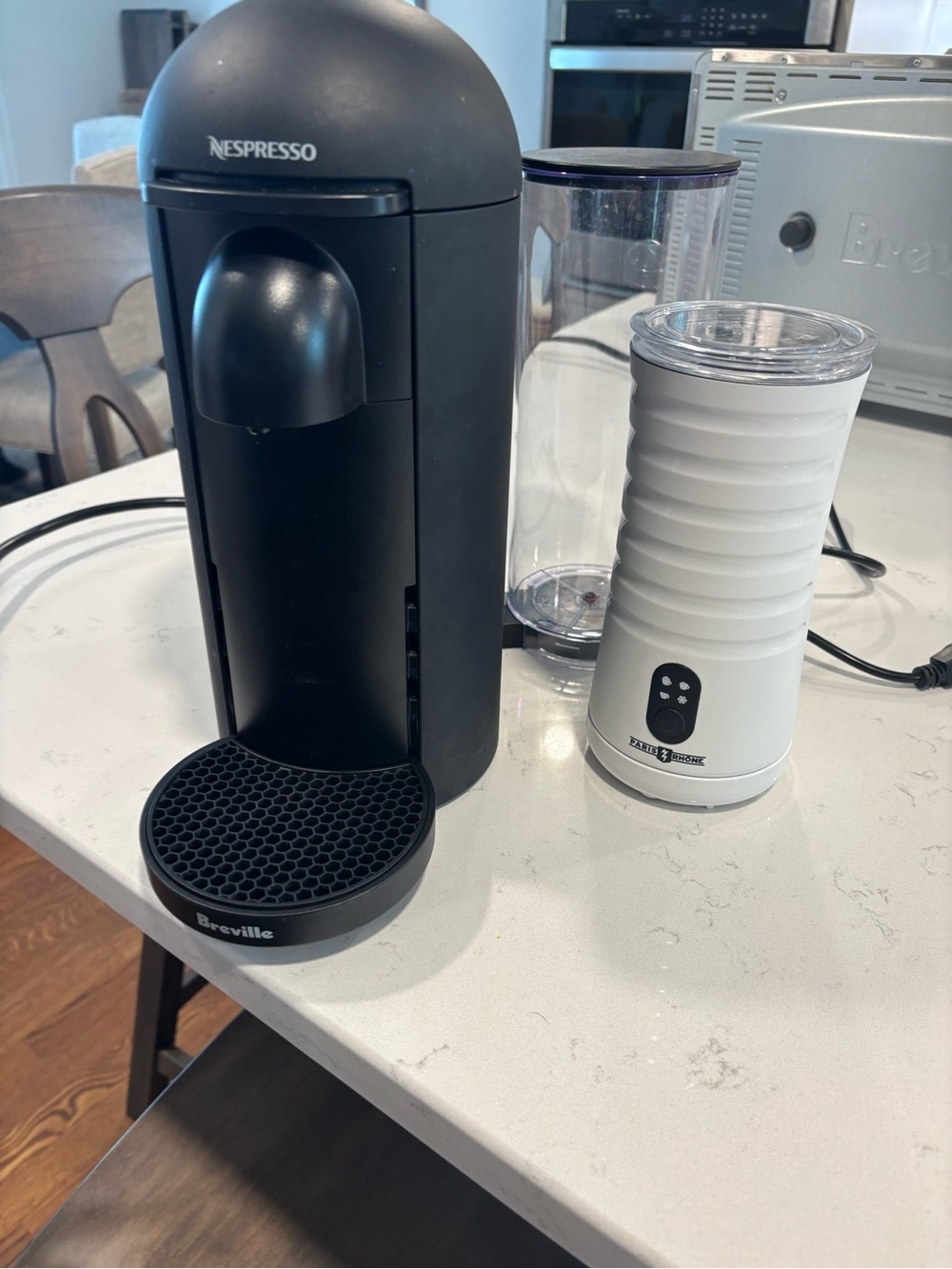 Nespresso Single-Serve Capsule Coffee Maker in Black with White Milk Frother